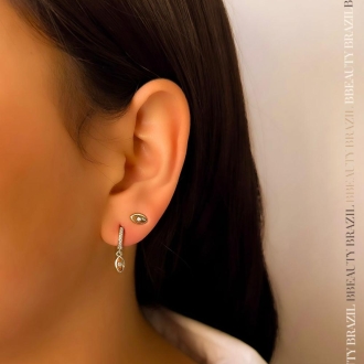 Detalhes do produto Brinco olho grego com uma zirconia cristal em ródio