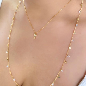 Detalhes do produto Colar uma chave cravejada com três zircônias em ouro