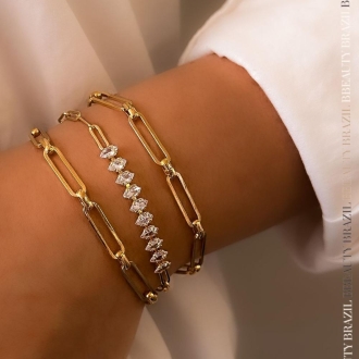 Detalhes do produto Pulseira elos cartier e navete cristais, em ouro