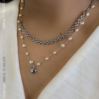 Detalhes do produto Colar mini pérolas formato coração e um coração liso, em ródio.