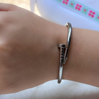 Detalhes do produto Bracelete Prego oval, liso e articulado, em ródio.