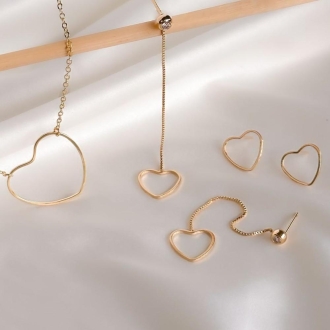 Detalhes do produto Colar Elo Americano Com Coração Vazado E Liso, Em Ouro.