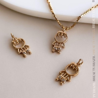 Detalhes do produto Pingente Menino com duas Zircônias em Ouro
